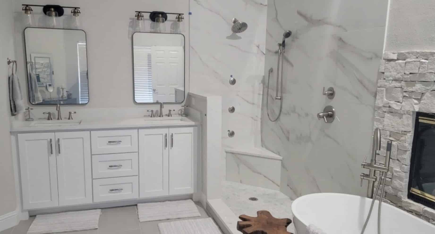 Luxury master bathroom remodel in Grapevine, TX — marble shower, double vanity, and freestanding soaking tub by I Love My Bathroom